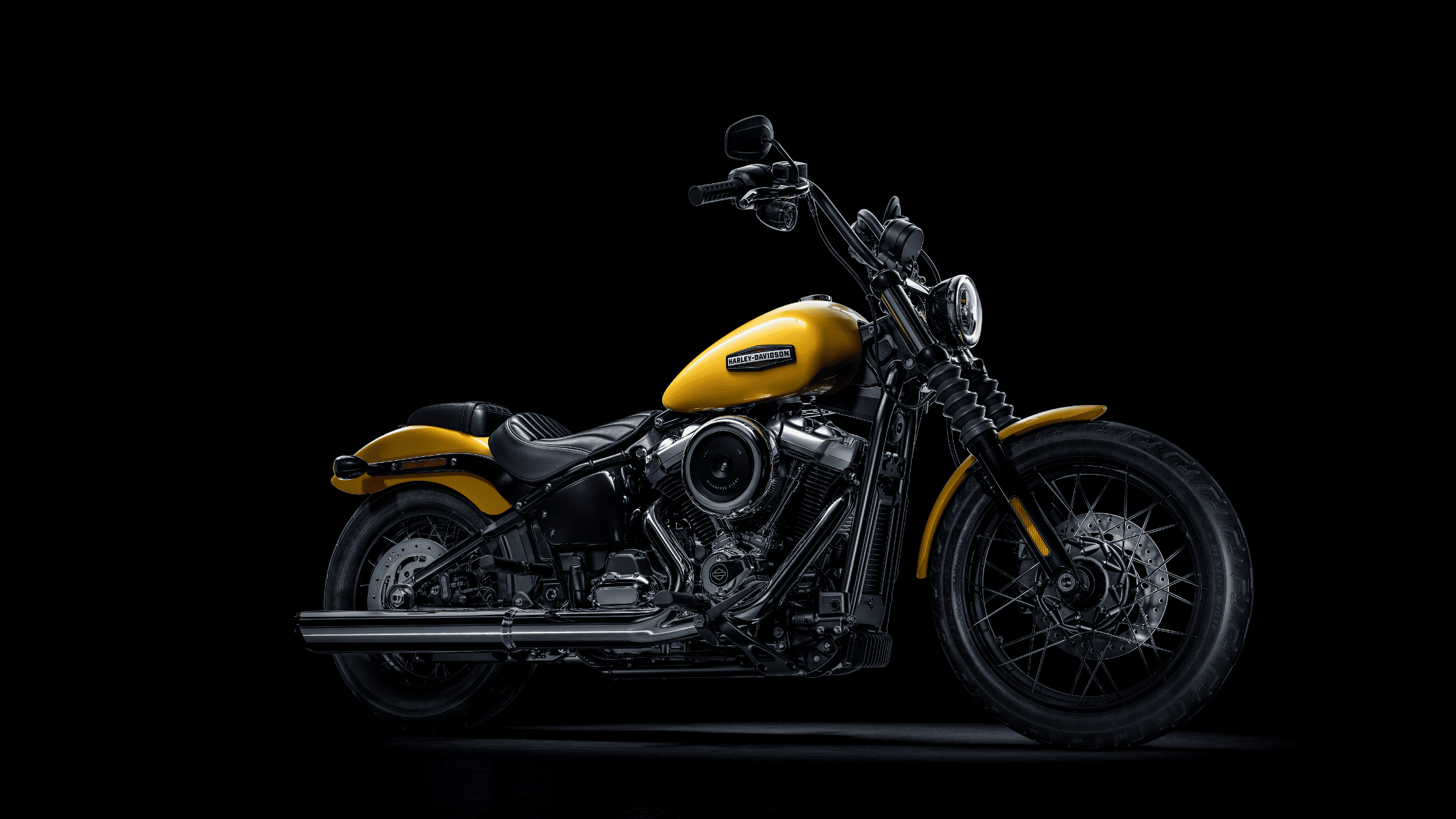 2025 Harley-Davidson Street Bob in bright yellow with minimalist bobber styling and solo seat