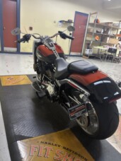 2025 Harley-Davidson® Fat Boy® Whiskey Fire / Vivid Black thumb 0