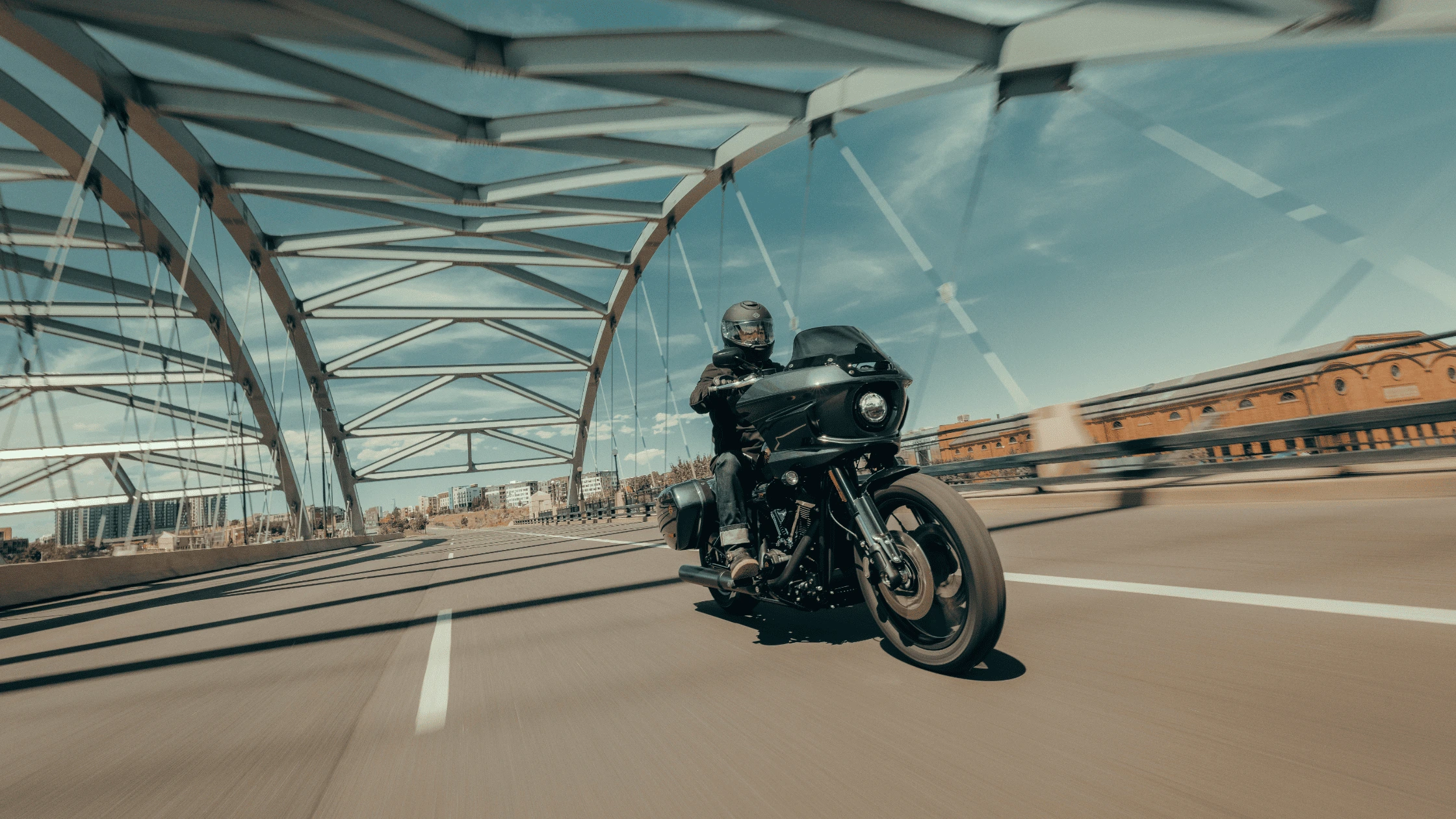 2025 Harley-Davidson® Low Rider® ST on the streets of McDonough GA, blending touring comfort with sporty performance.