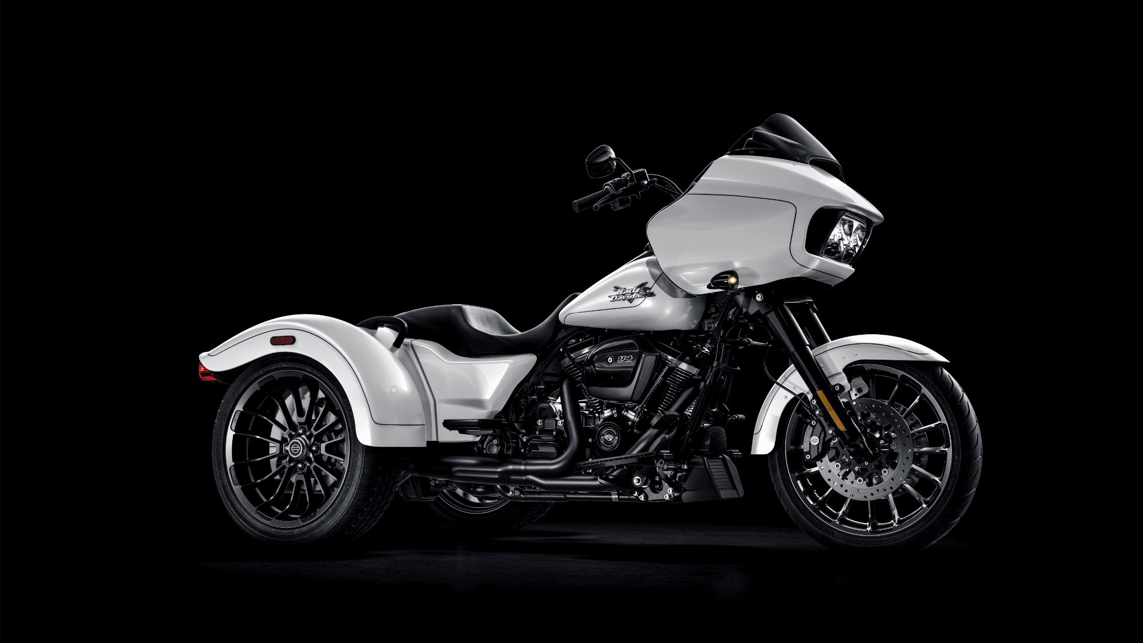 2025 Harley-Davidson® Road Glide® 3 in white on black background near Atlanta GA showcasing three-wheel stability.