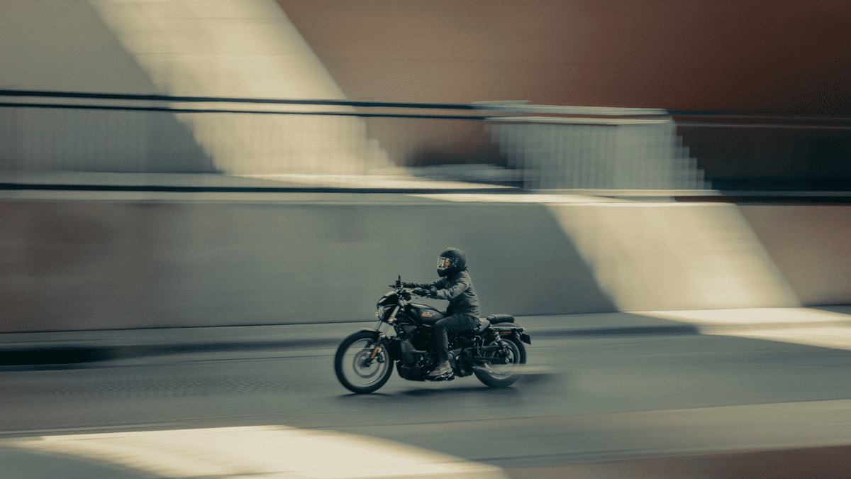 2025 Harley-Davidson® Nightster® Special cruising through Sanford city streets, ideal for new riders seeking agility & modern performance.