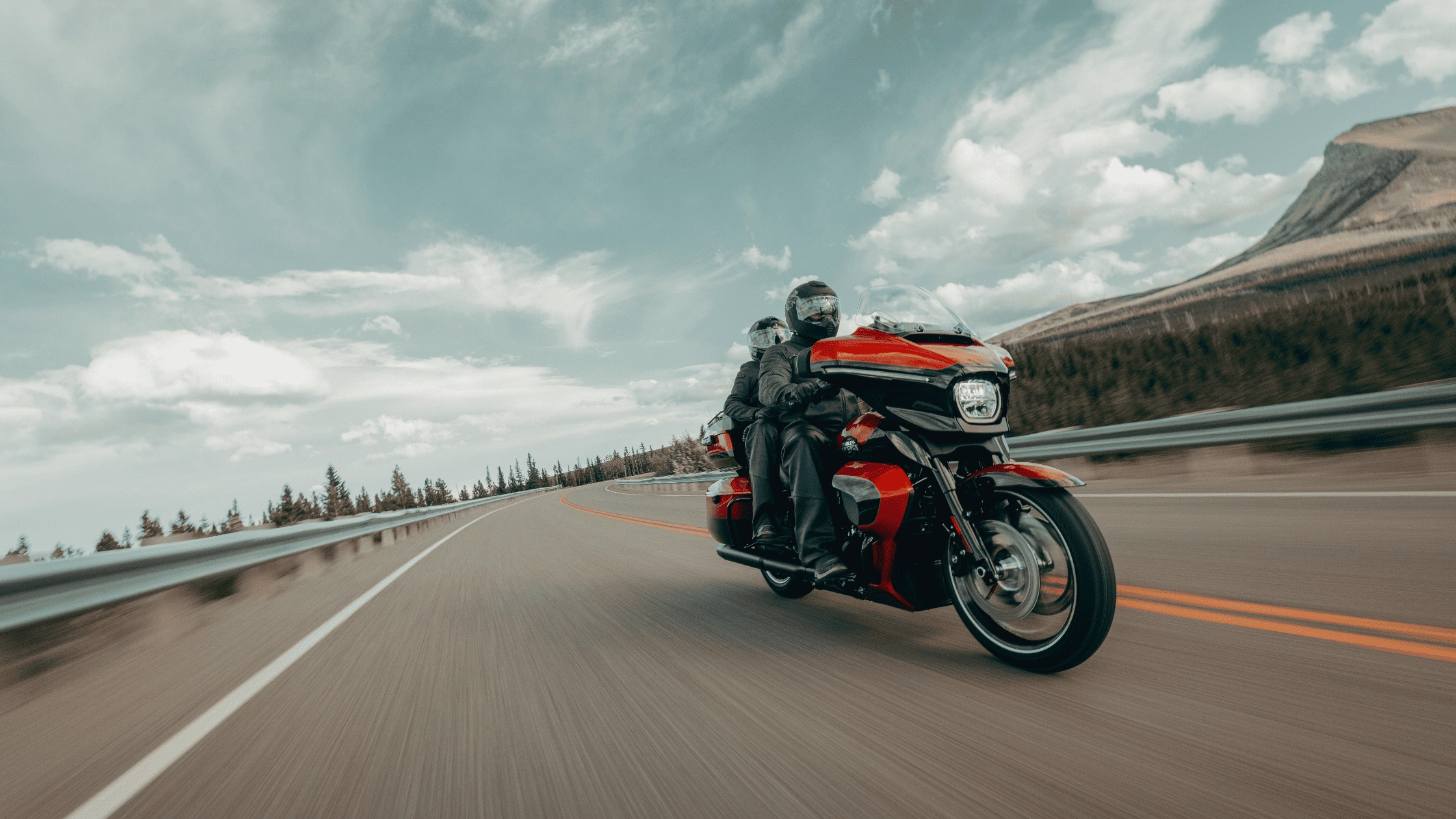 The 2025 Harley-Davidson® Street Glide® Ultra near Sunrise, FL, photographed in motion, offering answers for new riders interested in long-distance touring bikes.