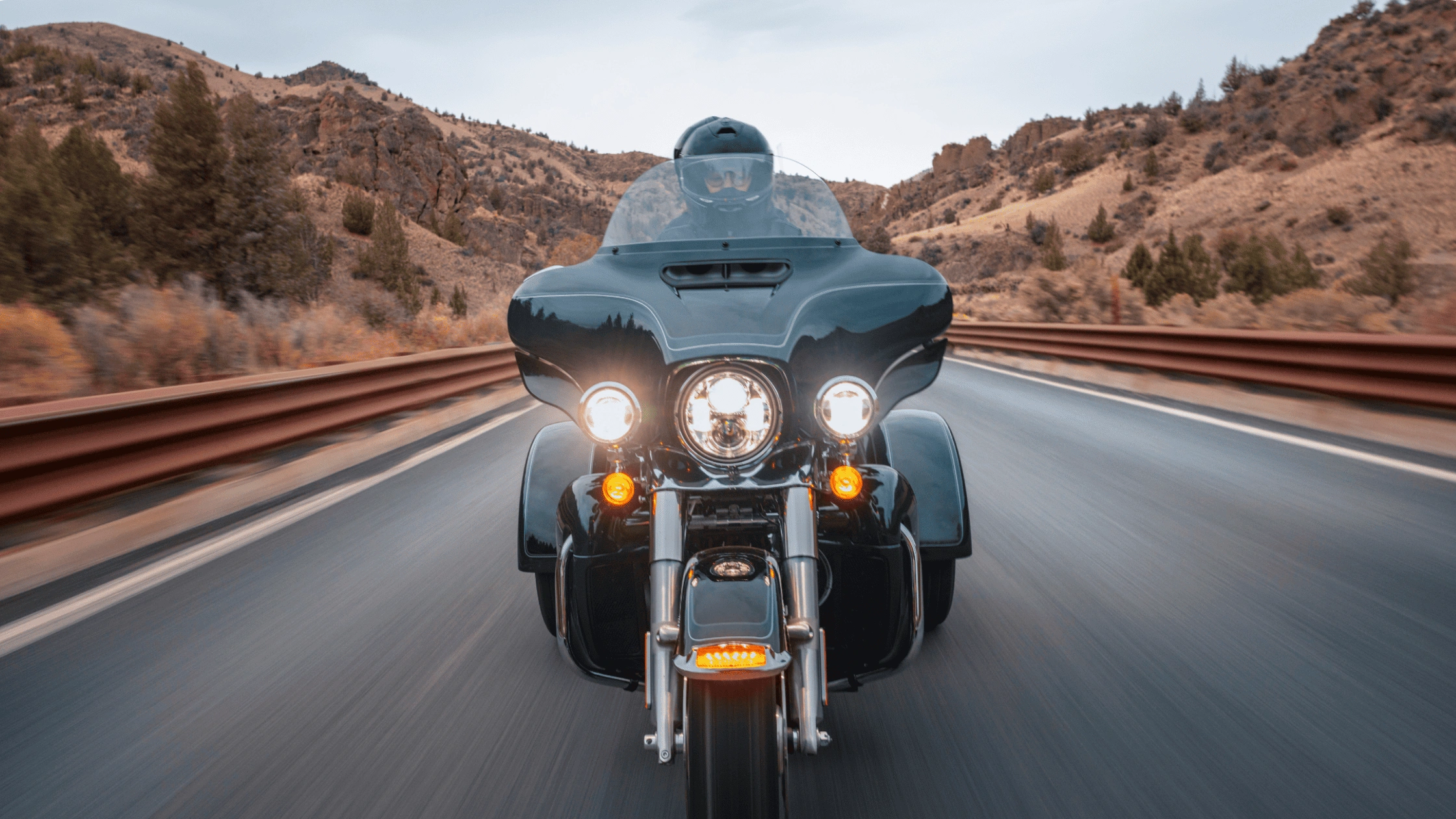 2025 Harley-Davidson® Tri Glide® Ultra riding on the highway near Bentonville, AR, built for long-distance touring comfort and stability.