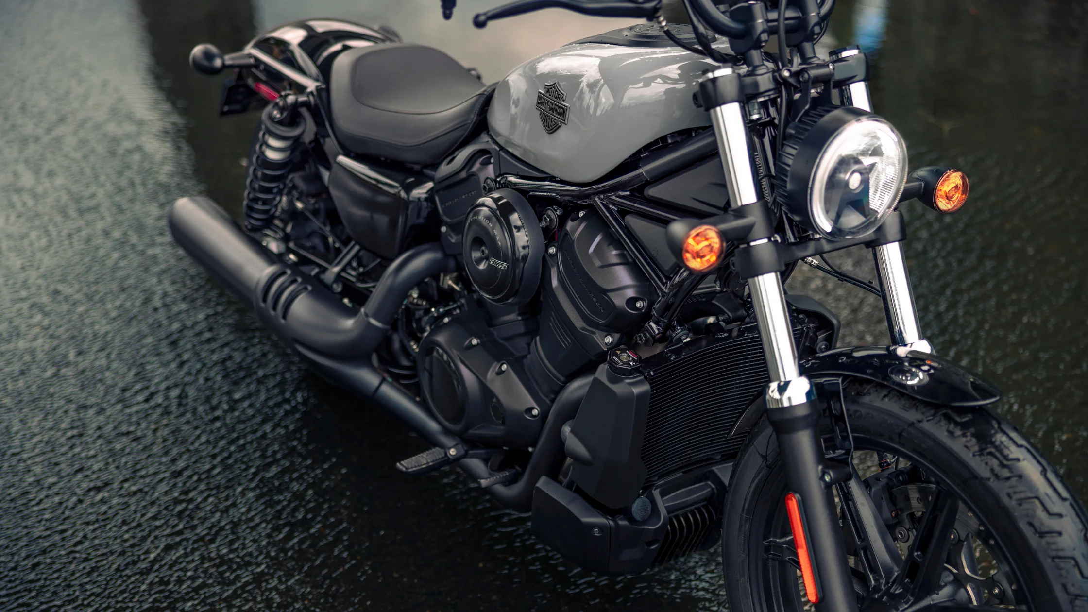 Close view of 2025 Nightster® showing modern tank, LED headlamp and blacked-out engine detailing.