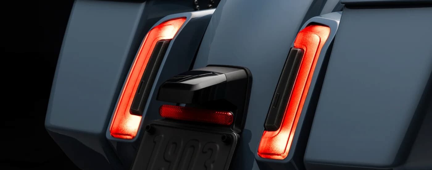 A close up of the rear on a blue 2024 Harley-Davidson Road Glide.