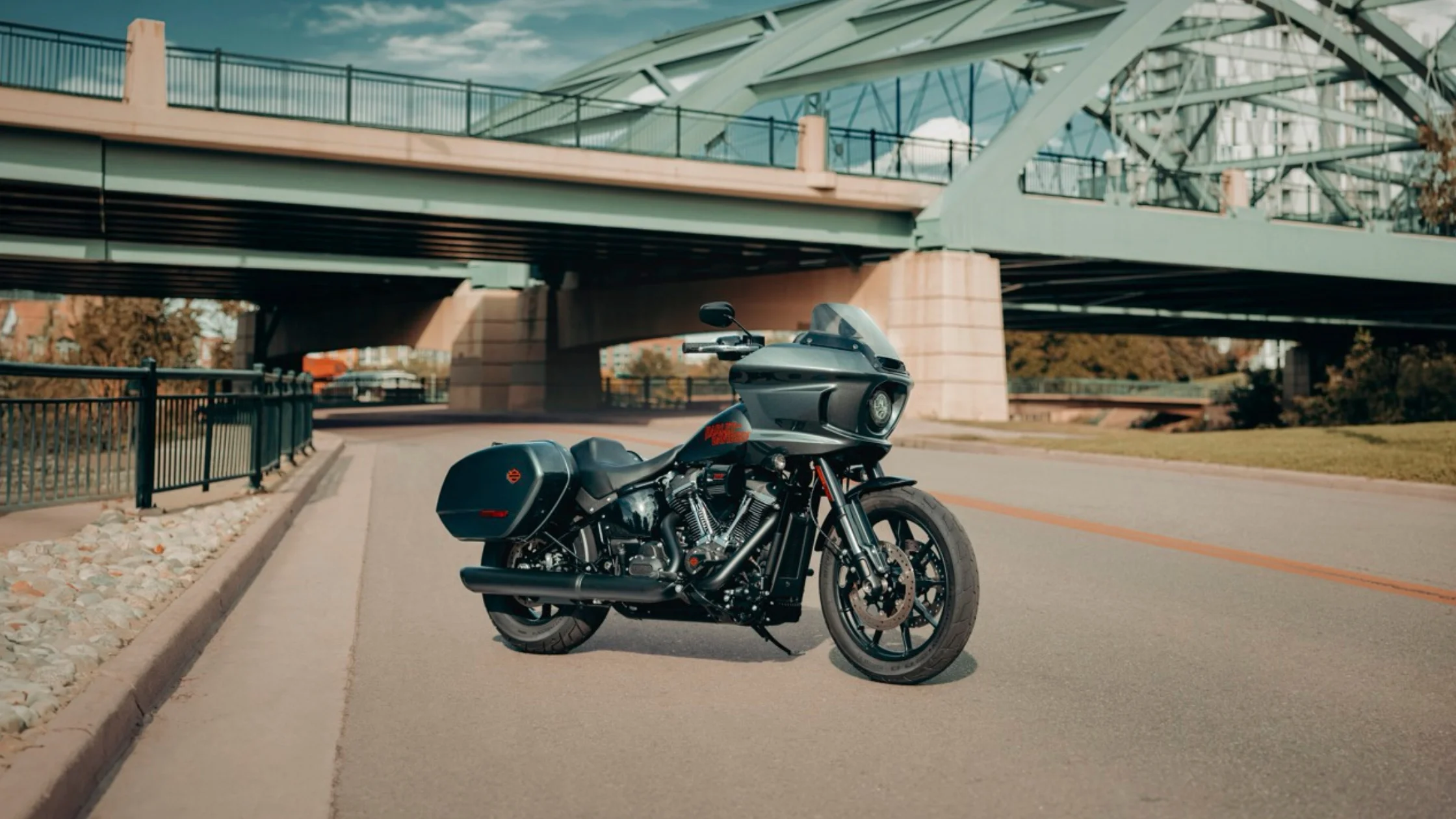2025 Harley-Davidson® Low Rider® ST touring cruiser with frame-mounted fairing and saddlebags