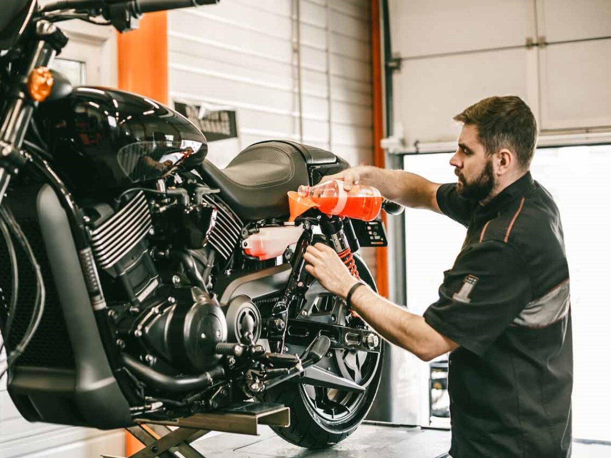 Harley-Davidson service technician at work.