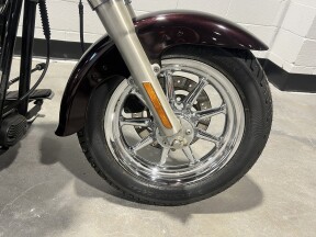 2005 Harley-Davidson® Fat Boy® Two-Tone Black Cherry Pearl and Black Pearl FLSTFI thumb 2