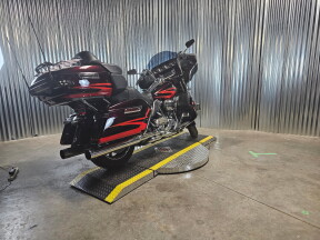 2017 Harley-Davidson® CVO™ Limited Black Garnet & Electric Red Pearl with Carbon Dust including Cont thumb 1