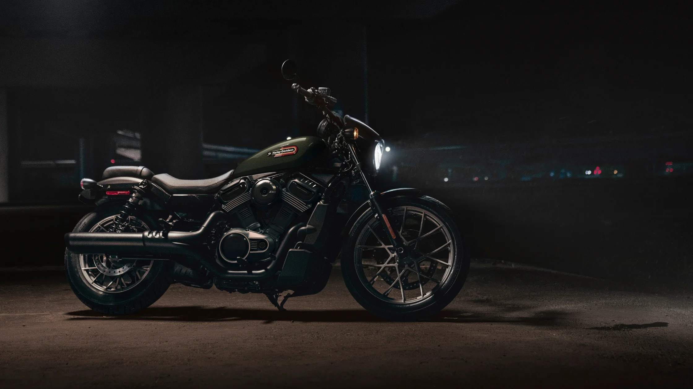 2026 H-D® Nightster® Special cruiser motorcycle parked under city overpass at night