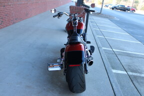 2025 Harley-Davidson® Fat Boy® Whiskey Fire / Vivid Black thumb 1