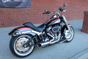 2025 Harley-Davidson® Fat Boy® Whiskey Fire / Vivid Black thumb 2