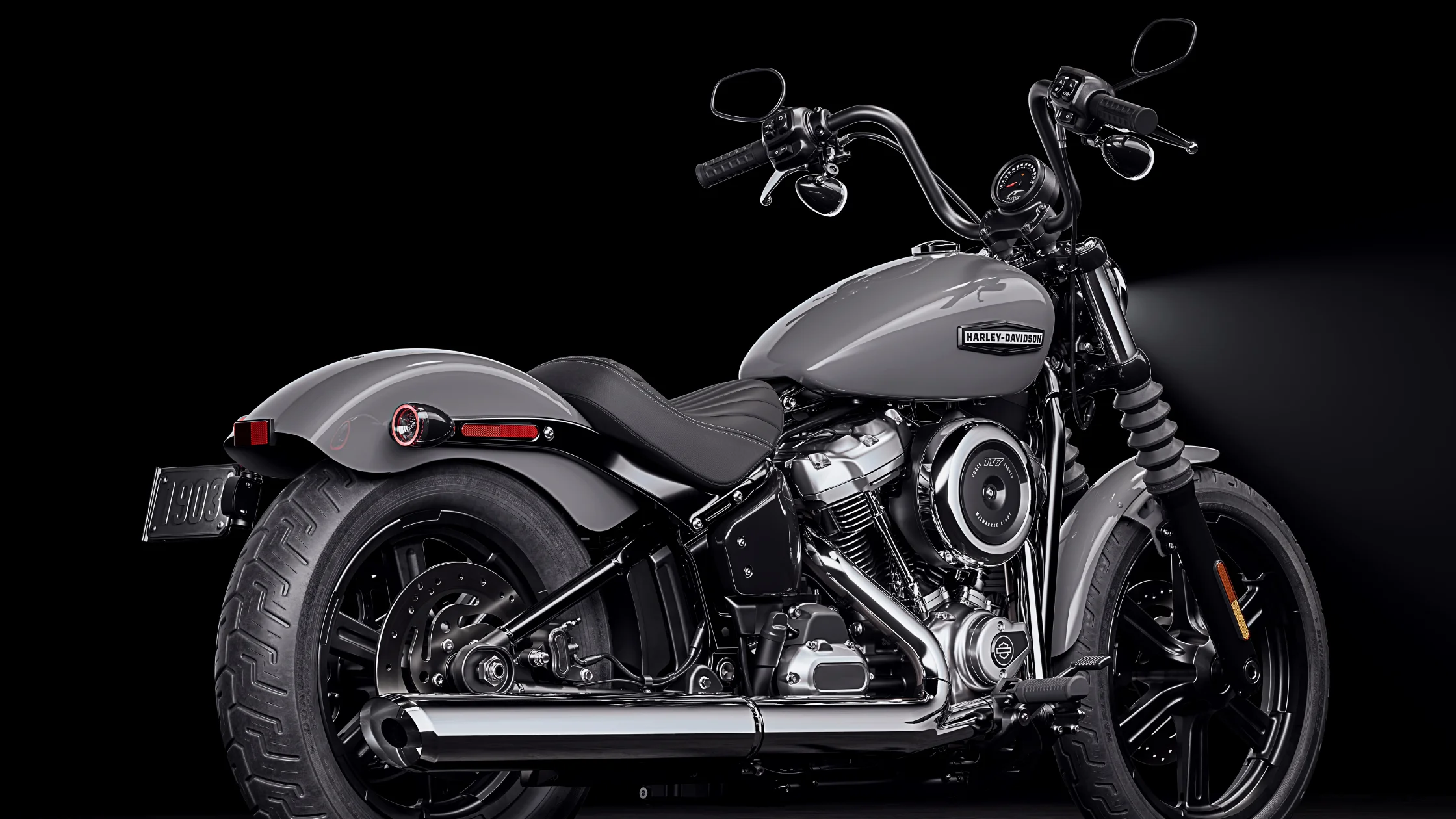 2026 Harley-Davidson® Street Bob® cruiser in gray studio shot featuring minimalist design and Milwaukee-Eight engine.