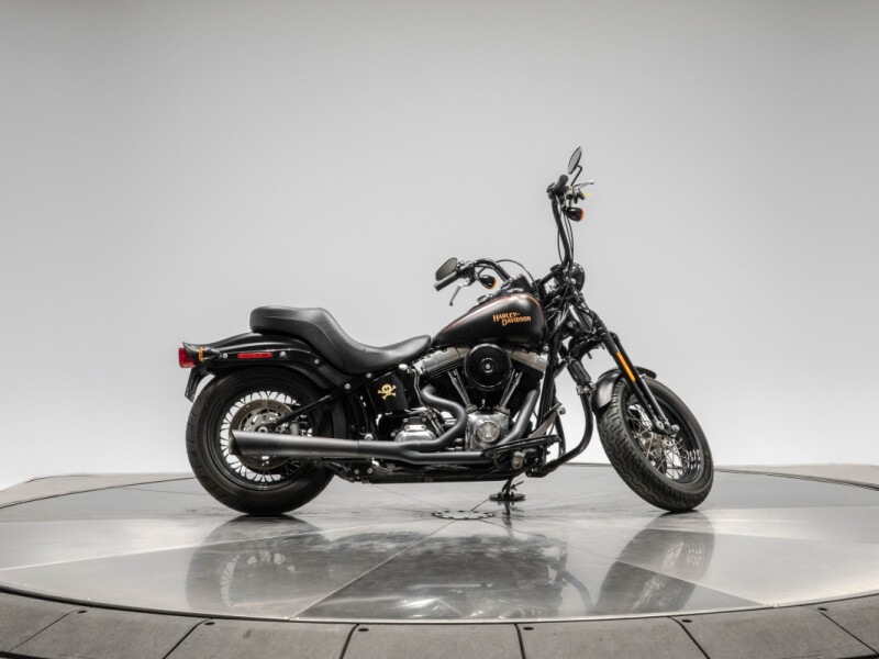 2009 HARLEY-DAVIDSON FLSTSB CROSS BONES in black denim with 10,007 miles