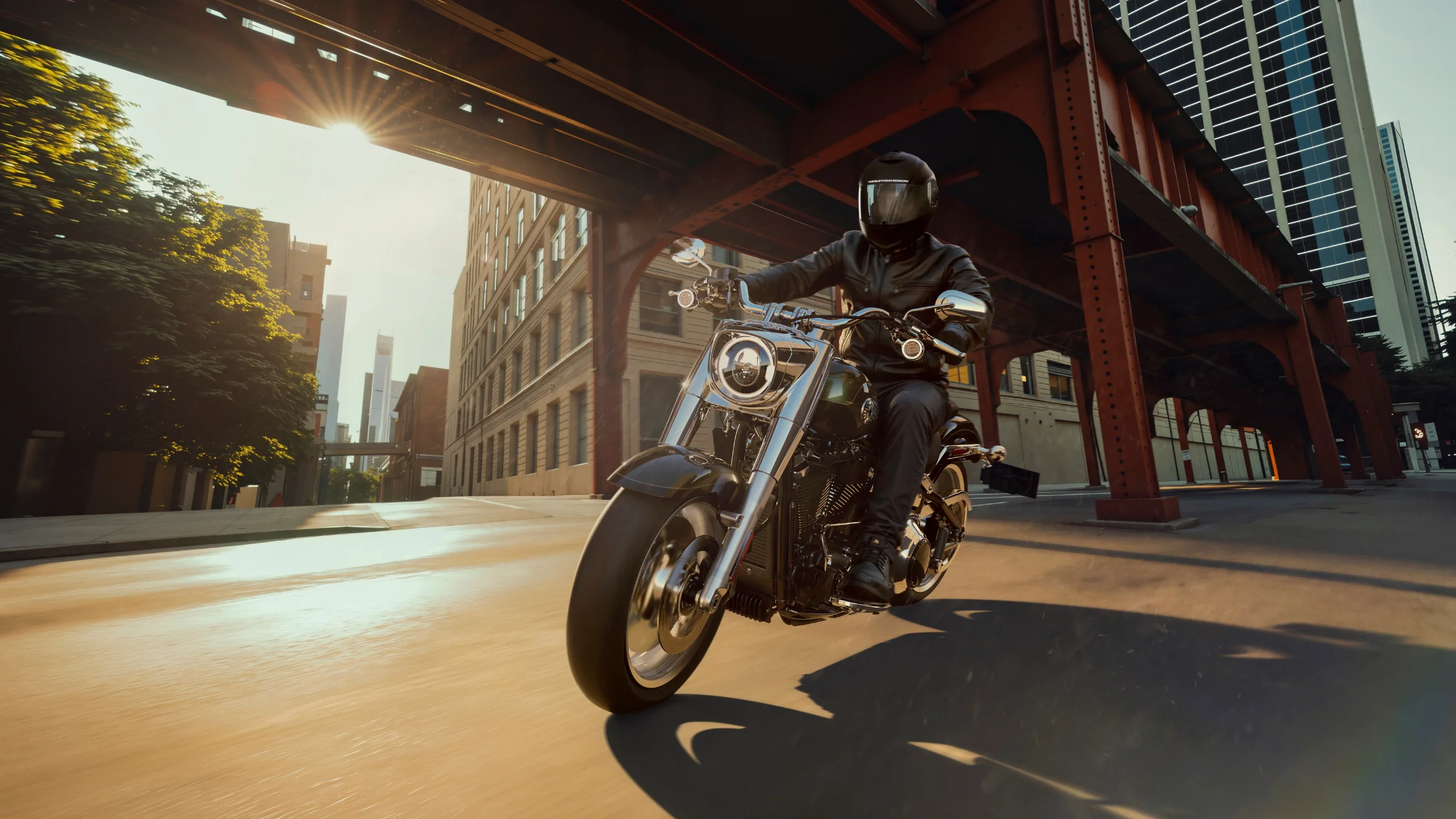 2026 Harley-Davidson® Fat Boy® ridden through a downtown city street.