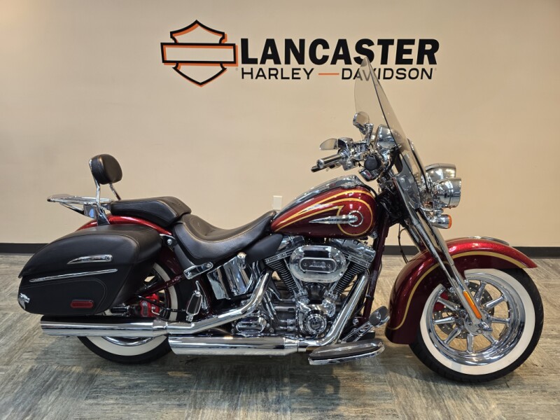 2014 Harley-Davidson® CVO™ Softail® Deluxe Crimson Red Sunglo and Ruby Flake FLSTNSE