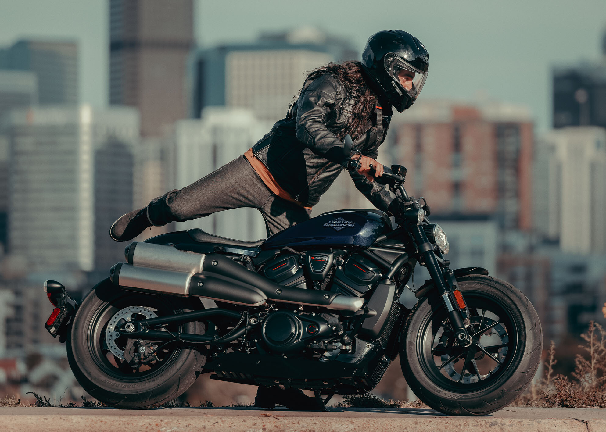 Rider mounting used Harley-Davidson motorcycle