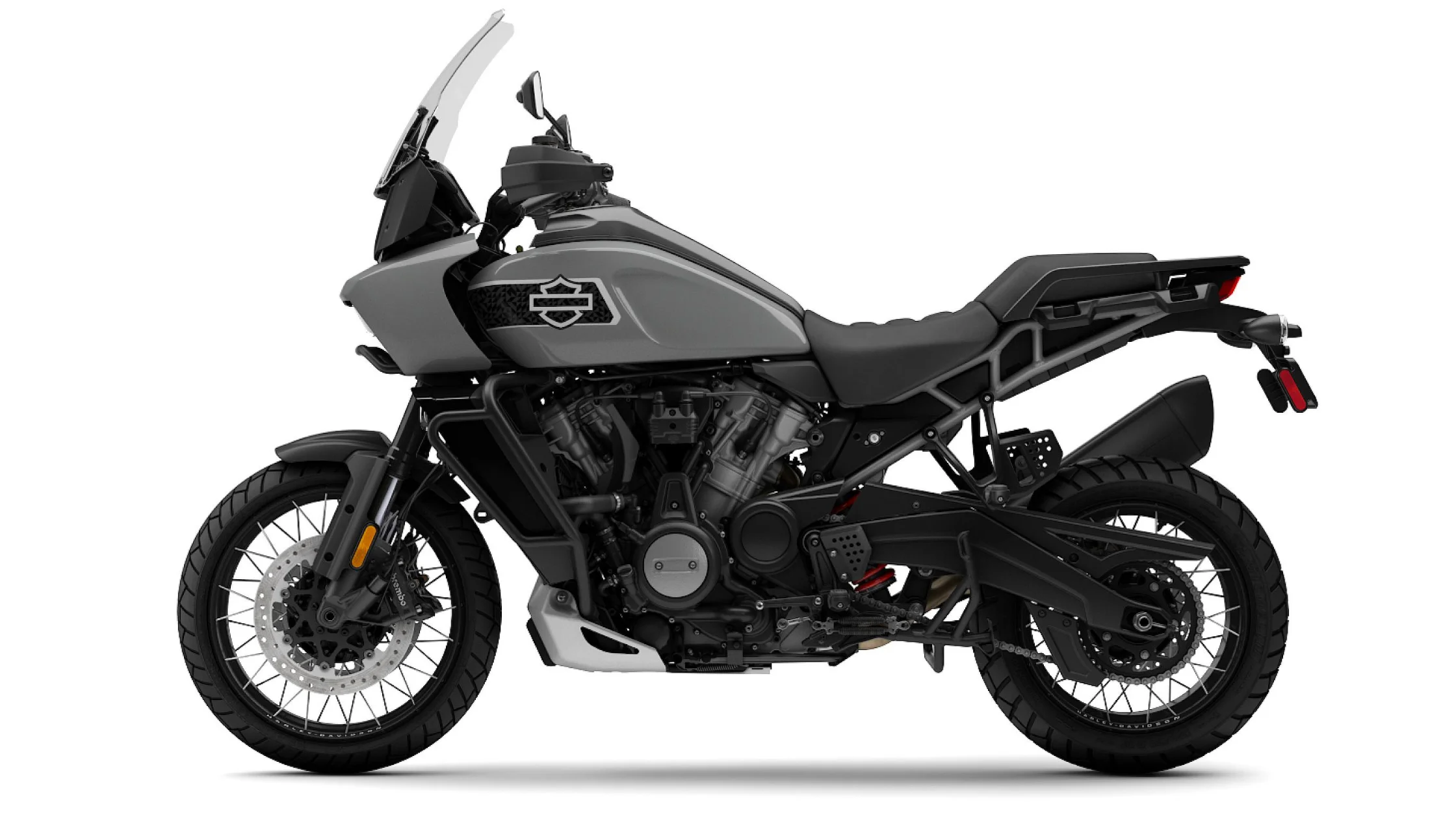 2026 Pan America® 1250 Special adventure motorcycle side profile with tall windshield and spoked wheels.