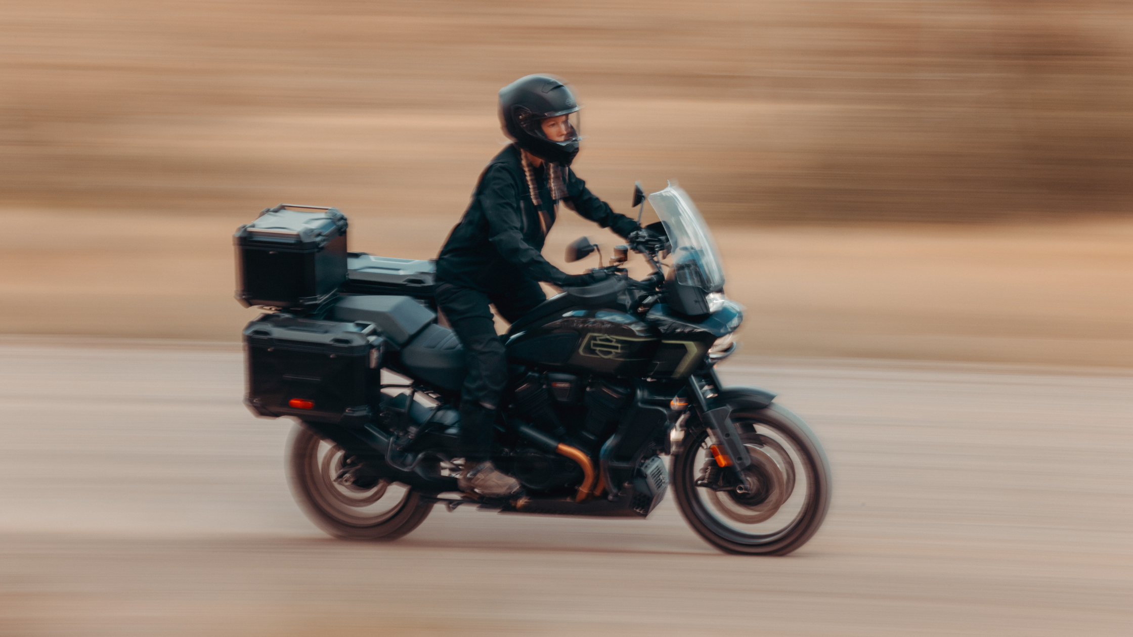 2026 Pan America® 1250 Limited adventure motorcycle riding across desert terrain