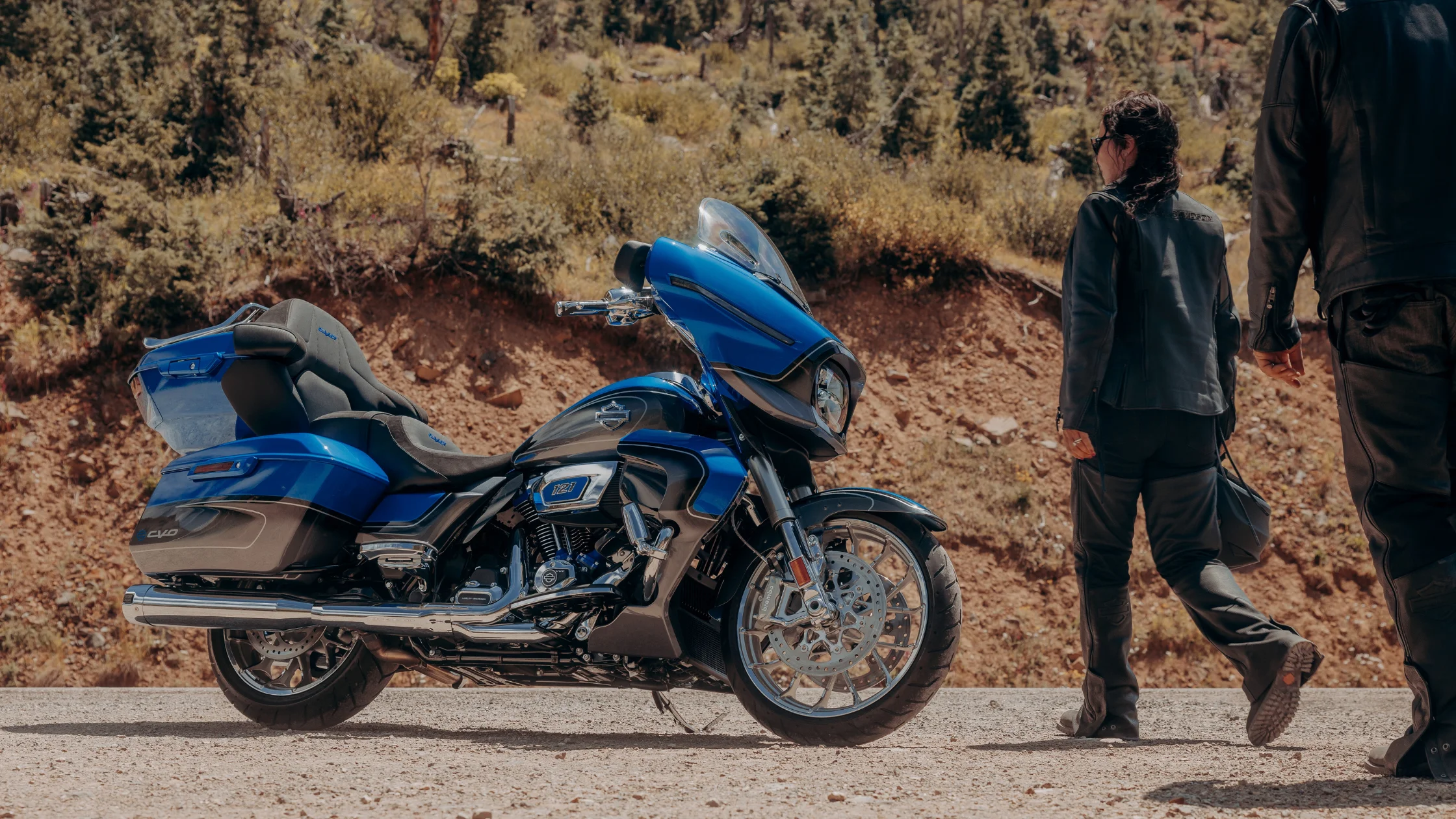 2026 H-D® CVO™ Street Glide® Limited in blue parked on a mountain road