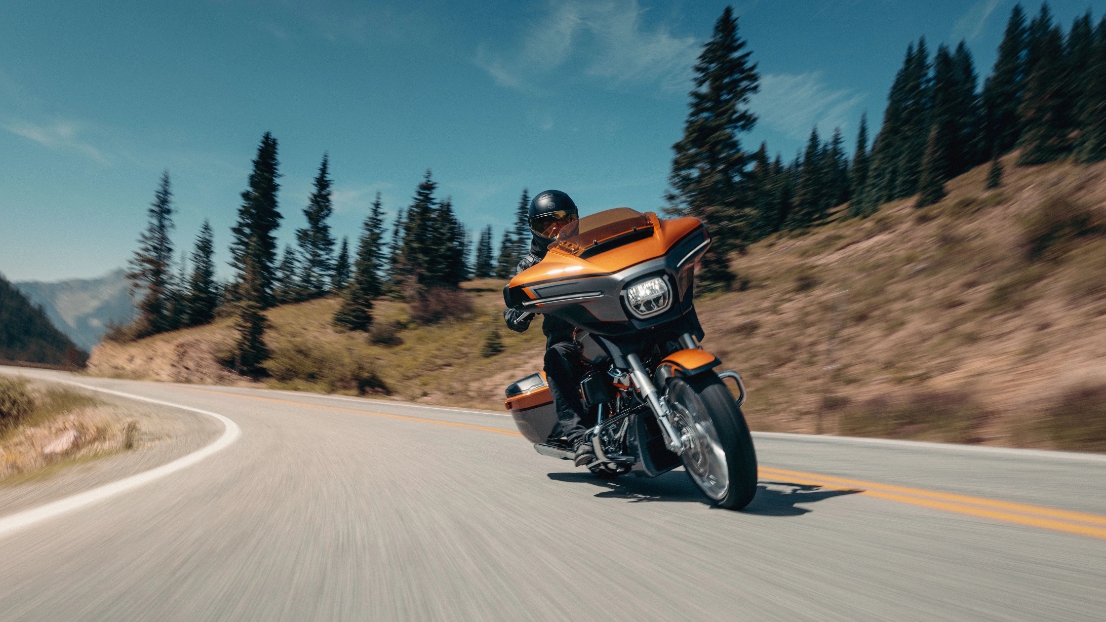 2026 Harley-Davidson® CVO™ Street Glide® motorcycle parked near a backyard fence