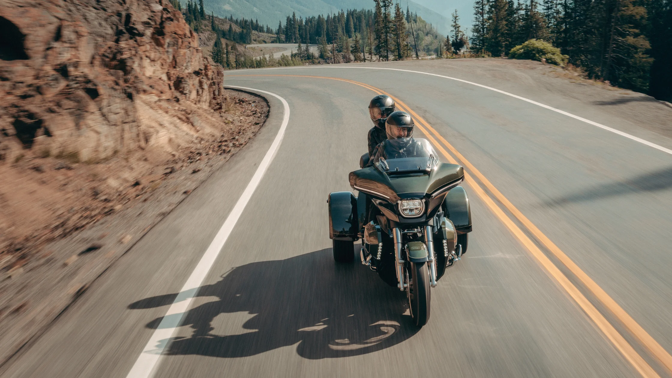 2026 Harley-Davidson® Street Glide® 3 Limited trike riding on a mountain road