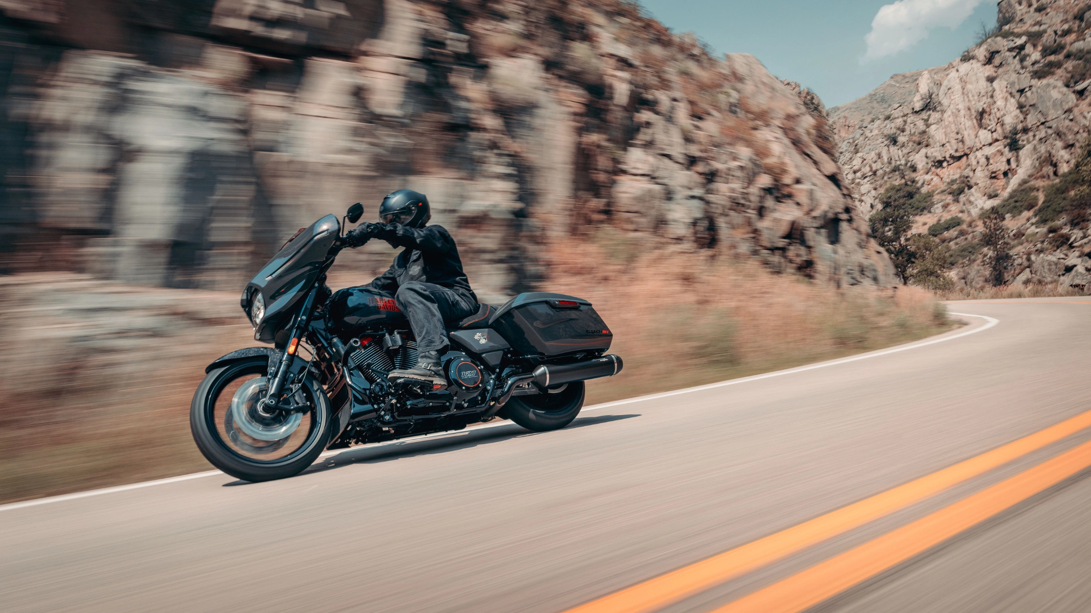 2026 Harley-Davidson® CVO™ Street Glide® ST riding on a winding mountain road