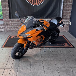 2025 Kawasaki NINJA® 650 Candy Steel Furnace Orange/Metallic Spark Black/Metallic Royal Purple thumb 1