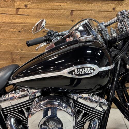 2006 Harley-Davidson® Springer Softail Vivid Black FLSTSCI thumb 3