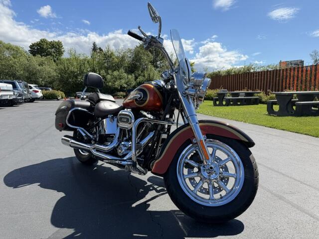 2014 Harley-Davidson® CVO™ Softail® Deluxe Maple Metallic and Atomic Orange with Airflow graphics