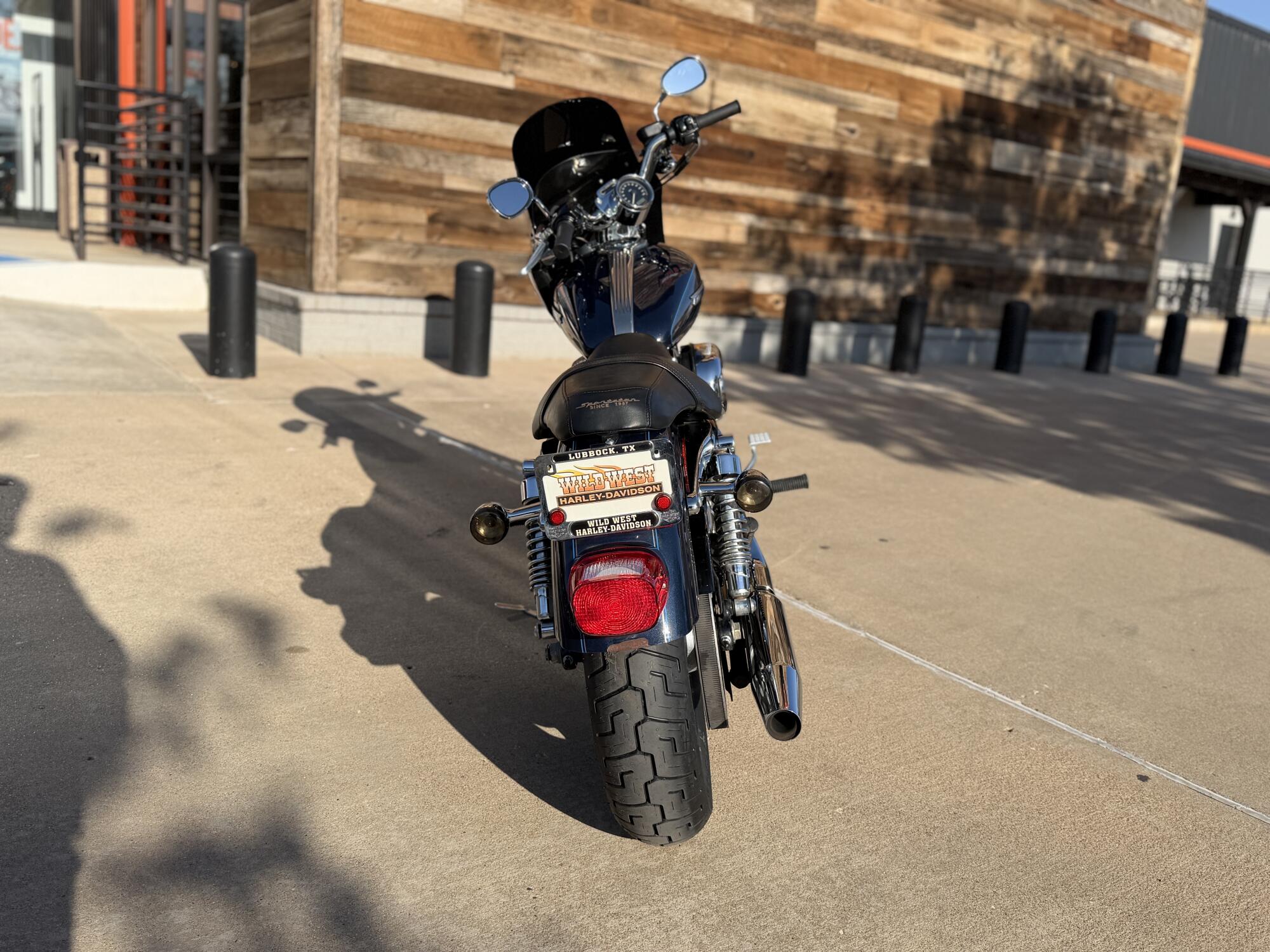 2009 Harley-Davidson® 1200 Custom Dark Blue Pearl, photo 7